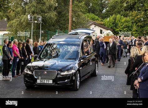 The coffin of Hollie Thomson is carried from St Michael's Church, west