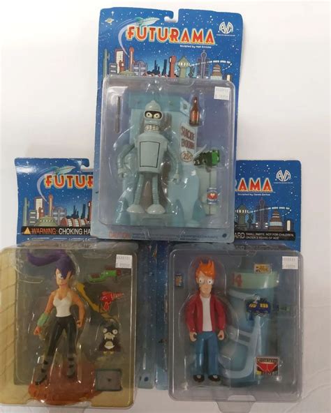 Three Action Figures From Futurama Are Displayed