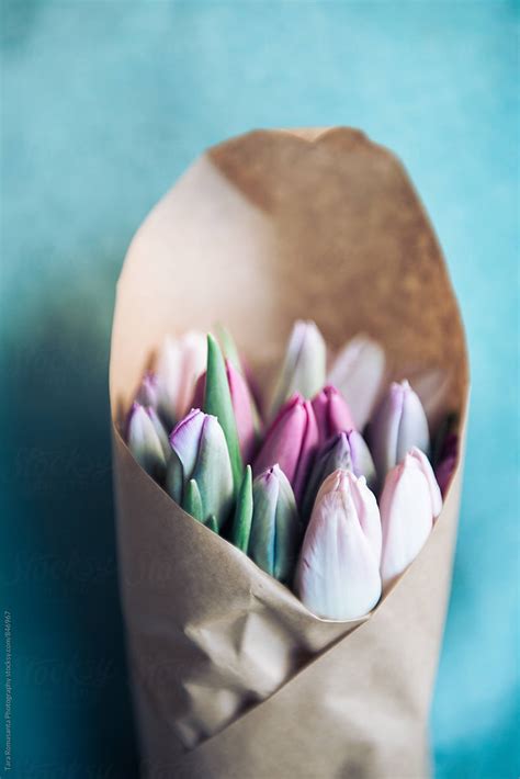 Tulip Bouquet Wrapped In Brown Paper By Stocksy Contributor Tara