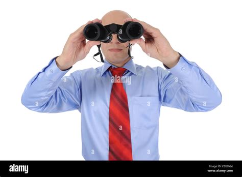 Businessman Looking Through Binoculars Stock Photo Alamy