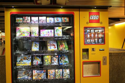 In order to take items out of a vending machine, you're first of all going to have to trade in a specific quantity of spare materials that you've harvested. And then we found a lego vending machine | Sarah-Rose | Flickr