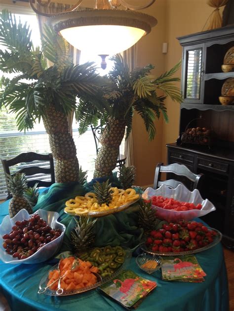 Using the larger fruit first, push the fruit onto the toothpicks, then fill in with the smaller fruits. 16 best pineapple palm tree fruit centerpiece images on ...