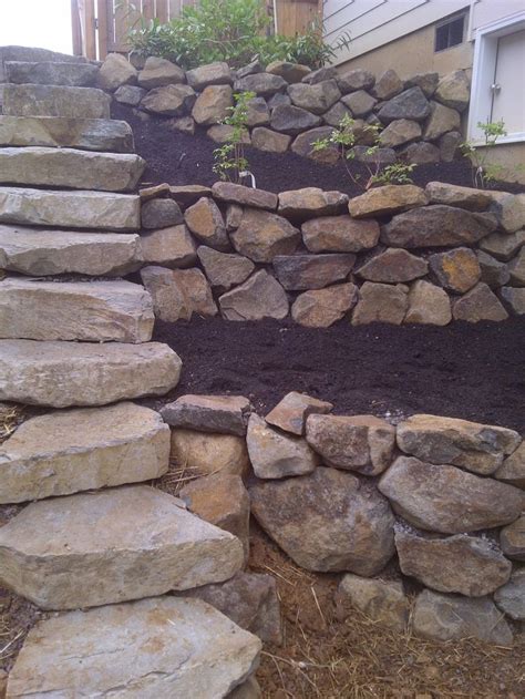 Gardens and landscaping / backyards, retaining walls. Rock retaining wall with stairs | Rock retaining wall ...