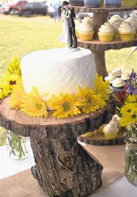 Logs Are Used To Make A Woodsy Diy Cake Stand