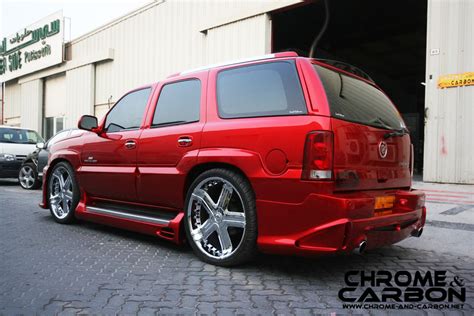 The cadillac escalade with fender flares and new side skirts. Tuning Cadillac Escalade SUV 2002 online, accessories and ...