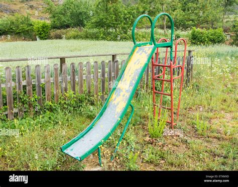 Children S Slide In Overgrown Playground In Rural Village In Spain