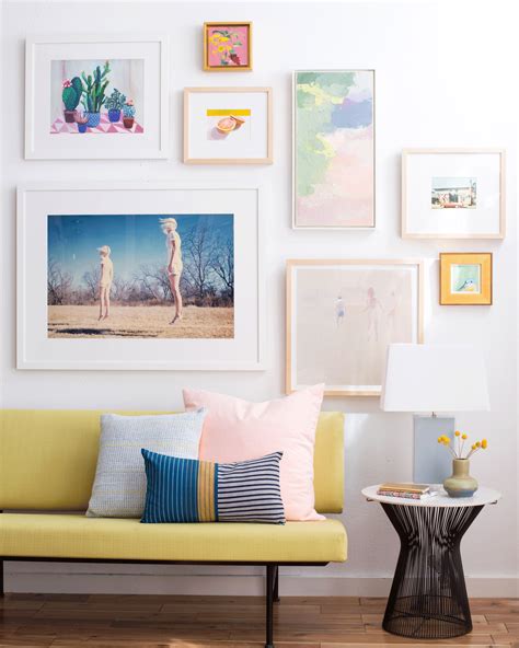 how to choose frame and hang an art collection natural home decor living room decor first