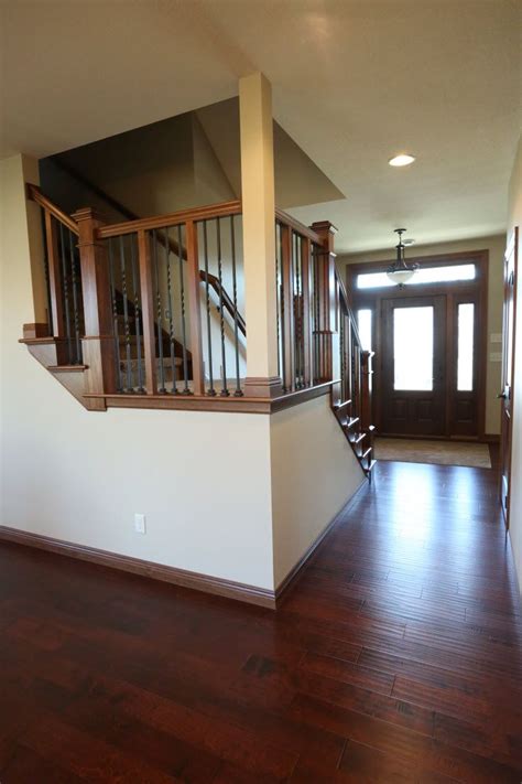 Stair Systems Staircase With Wood Hand Rails And Wrought Iron