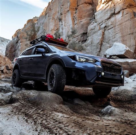 To take hold of and raise something in order to remove, carry, or move it to a different position: Lifted Subaru Crosstrek - The Recipe for an Off-road ...
