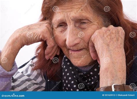 Portrait Of An Elderly Woman With Sad Face Expression Stock Image
