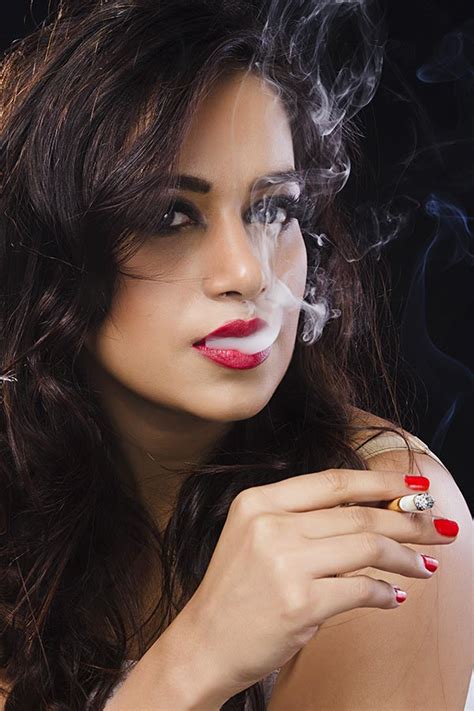 Indian Sexy Blonde Lady Smoking A Cigarette Smoke From Mouth