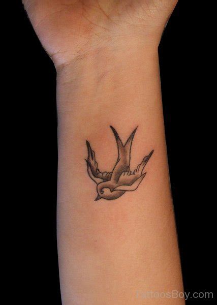Bird Tattoo On Wrist Tattoo Designs Tattoo Pictures