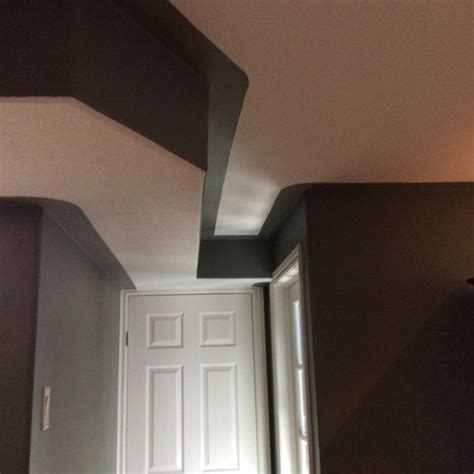 A bulkhead is an upright wall within the hull of a ship or within the fuselage of an airplane. Painting basement bulkheads - wall or ceiling colour?