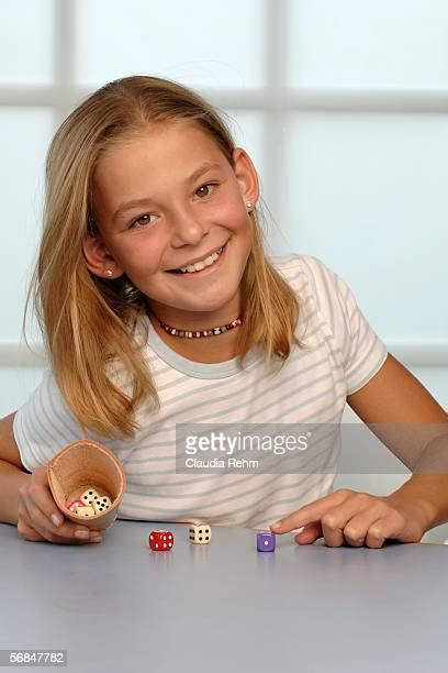 Girl Dice Photos And Premium High Res Pictures Getty Images