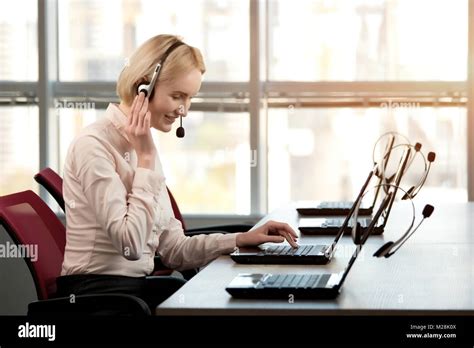 Side View Woman Wearing Headset Smiling Blond Lady Working As Call Center Operator Touching