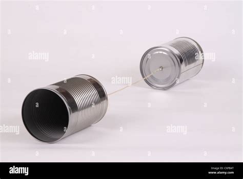 Two Tin Cans Connected By A String Stock Photo Alamy