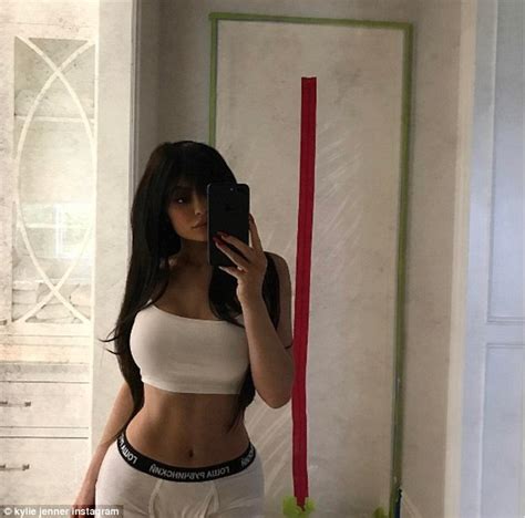 Kylie Jenner Puts On A Busty Display In White Underthings Daily Mail Online