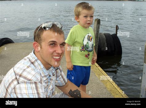 Handsome Father With Cute Son Stock Photo Alamy