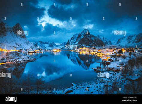 Classic View Of The Famous Fishing Village Of Reine With Olstinden Peak