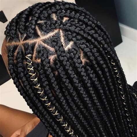 A light caramel beautifully complements black hair and a silver bead on a section of hair near the face is a super pretty detail. 35 Different Types of Braids for Black Hair
