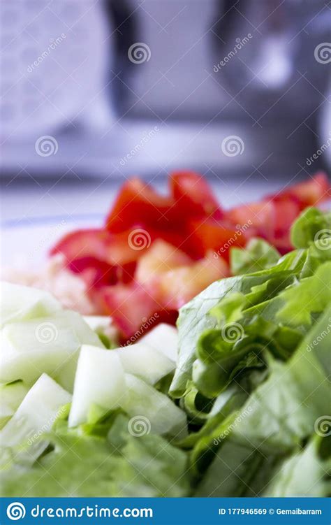 Salad With Lettuce Tomato Onion And Cucumber Stock Image Image Of
