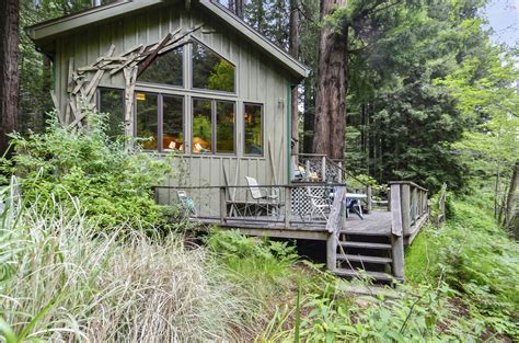 This stunning cabin rental is a very private, creek-side paradise