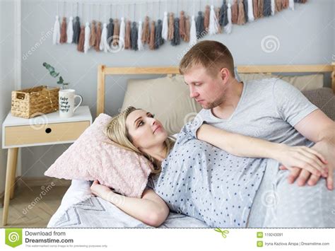 Beautiful Pregnant Woman And Her Husband Are Spending Time Together In Bed Stock Image Image