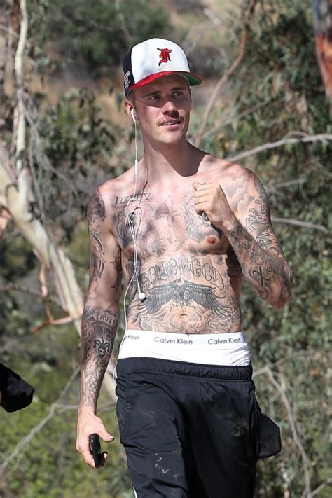 Justin Bieber Cant Keep His Shirt On Page Six