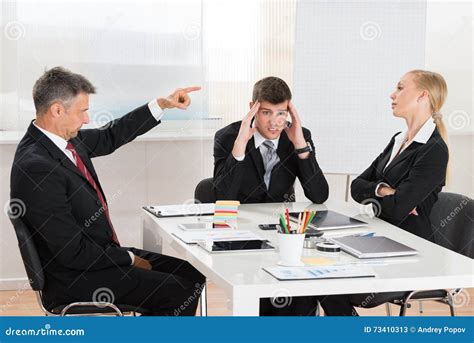 Businessman Arguing With His Two Co Workers Stock Image Image Of