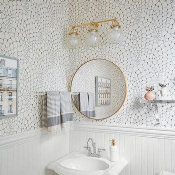 By the way, the name chair rail came into popular usage with the shakers, who installed boards with pegs on dining room walls to hang chairs off the floor for sweeping and cleaning. Beadboard Powder Room - Transitional - bathroom - BHG