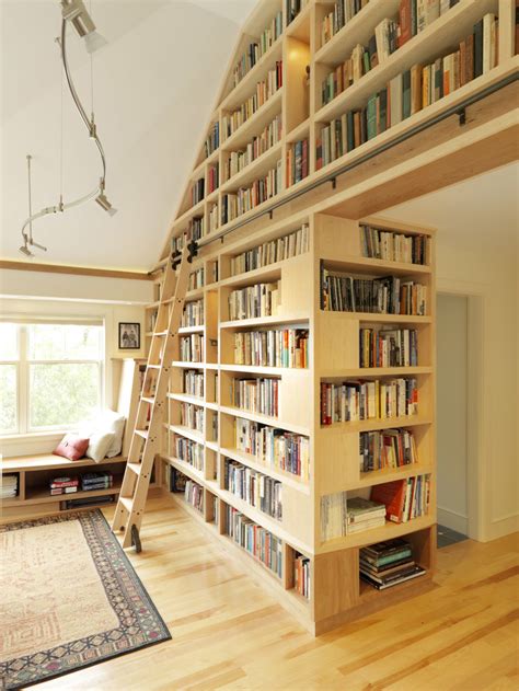 Entryway bench with coat rack and shoe storage. Floor to Ceiling Bookshelves - Fine Homebuilding