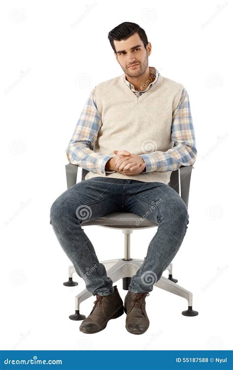 Young Man Sitting In Swivel Chair Stock Photo Image Of European