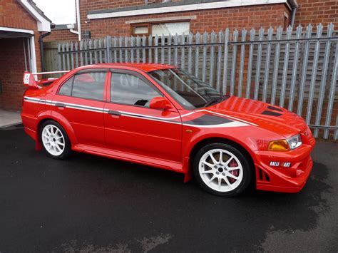 Ian's mitsubish evo vi evo 6 tommi makinen no 2 with autronics & antilag. The year I was born (1999) this monster was unleashed onto ...