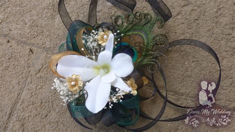 dress my wedding orchid wrist corsage with peacock feathers gold teal wrist corsage to