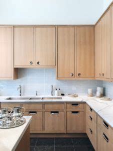 Explore modern takes on countertops and cabinets, breakfast nooks, kitchen islands, floors, backsplashes spark your imagination by browsing our collection of modern kitchens. waterworks modern kitchen with light wood cabinets // anne ...