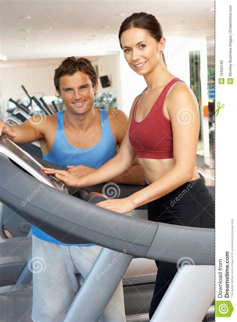 Woman Working With Personal Trainer Stock Image Image Of