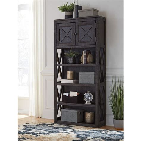 Six open long shelves provide sufficient space for everything from organizing baskets filled with accessories, to displaying favorite reads, clustered. Tyler Creek Large Bookcase Signature Design | Furniture Cart