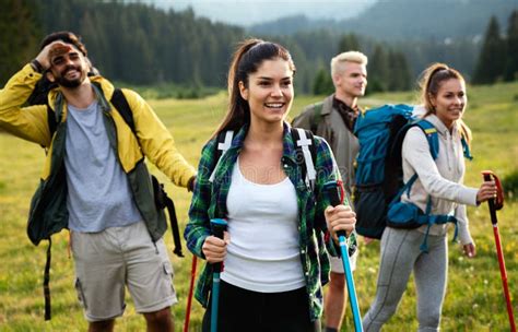 Group Of Friends On A Hiking Camping Trip In The Mountains Stock Photo