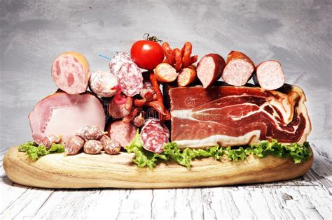 Cold Meat Assortment With Delicious Salami And Fresh Herbs Variety Of