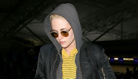 Kristen Stewart Covers Up New Buzzed Hair Arriving In Nyc Kristen