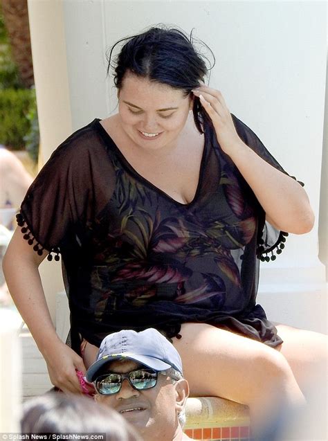 Scarlett Moffatt Slips Into A Number Of Summery Swimsuits As She Relaxes By The Pool In Las