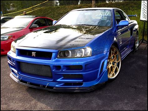 Nissan Skyline R34 Yes With The Blue Color And Golden Rims This Is