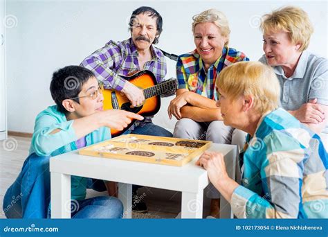 Senior People Playing Board Games Stock Photo Image Of Indoors