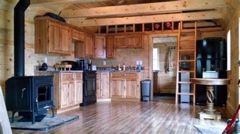 Minimalist tiny house bedroom loft with shed style ceiling. cabin built in to 14x40 lofted barn by Old Hickory Sheds idaho falls | Lofted barn cabin, Old ...