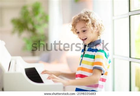 Child Playing Piano Kids Play Music Stock Photo 2198335683 Shutterstock