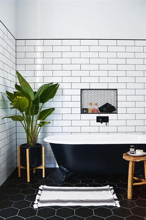 This black walls of the bathroom match with sleek black vanity with small black backsplash tiles. Bathroom Decor Crush: The Black Bath Tub