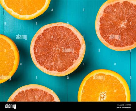 Fresh Oranges And Pink Grapefruits Citrus Fruit Blue Background Stock