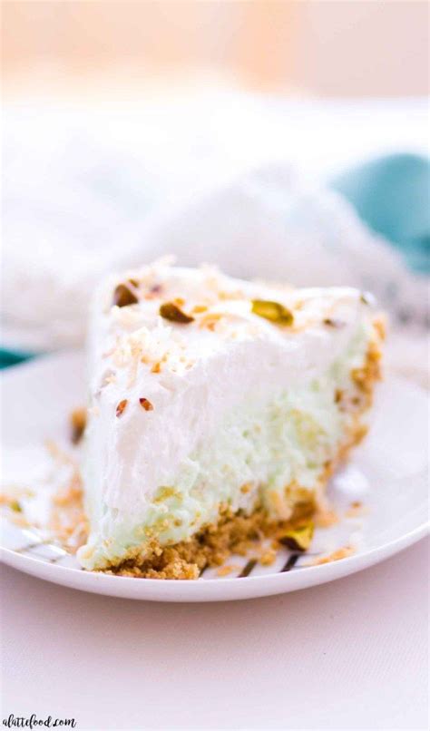 Perfect for a scorching hot summer day. This homemade no bake pistachio pudding cream pie is layers of graham cracker crust, pistachio ...