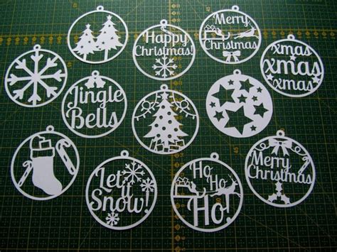 Christmas paper cut templates set of 12 PDF can be used to