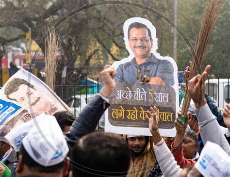 Image Of Aam Aadmi Party Aap Supporters Holding Cutout Of Arvind